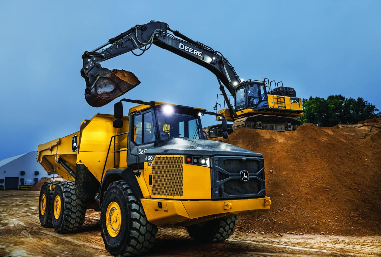 Mining excavator and dump truck